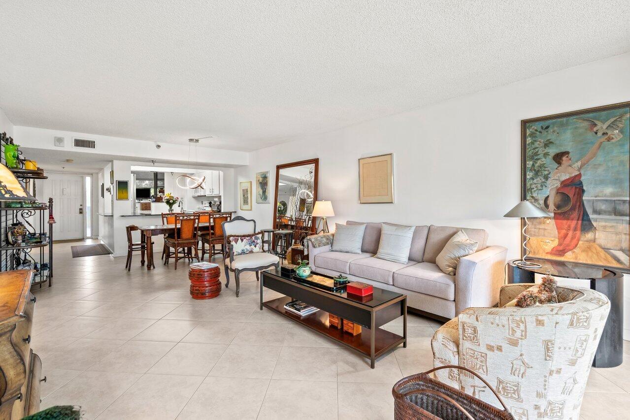 6320 Boca Del Mar Drive, Unit 302 Boca Raton, FL 33433 - Photo 5 of 35 a living room with furniture and a table