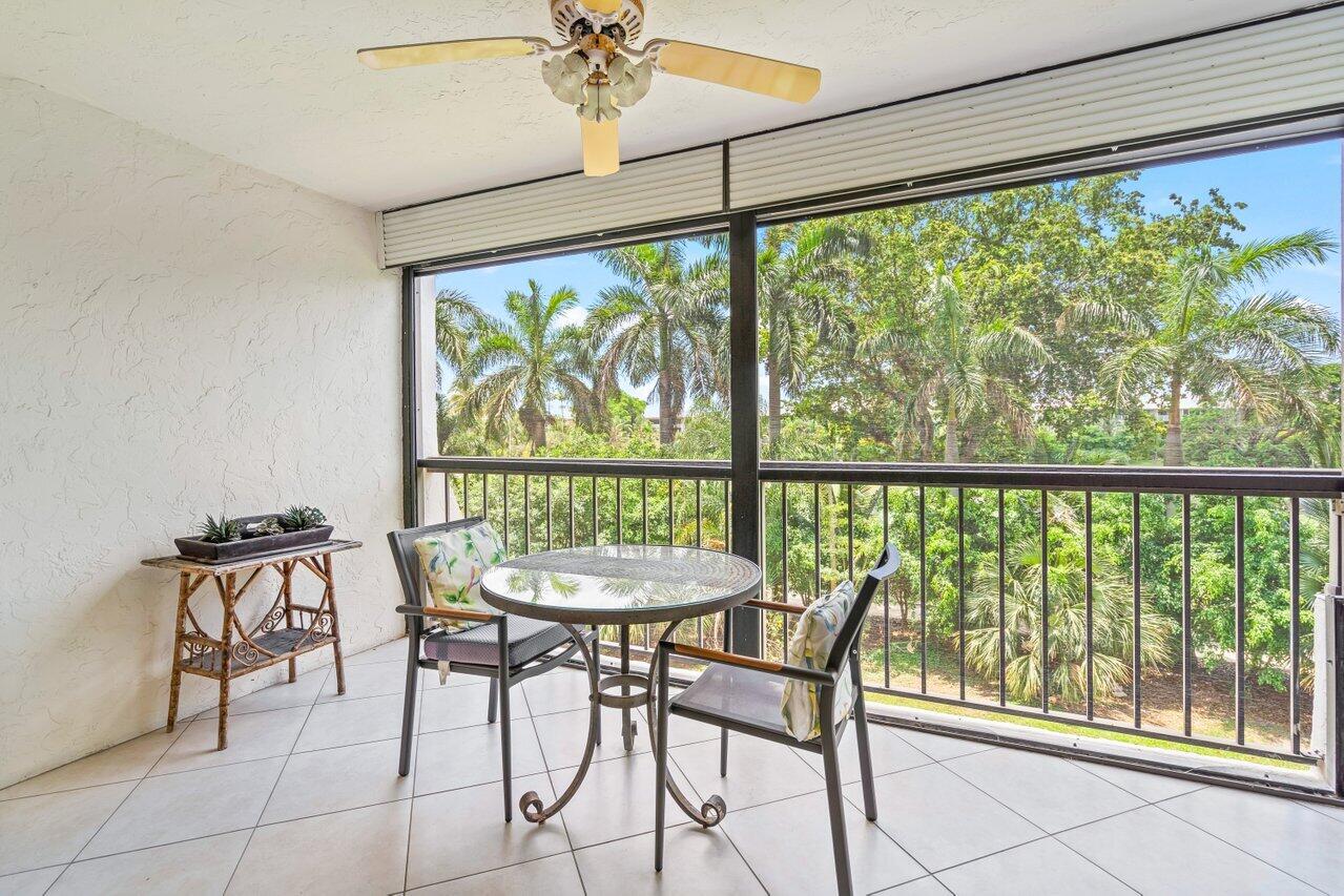 6320 Boca Del Mar Drive, Unit 302 Boca Raton, FL 33433 - Photo 9 of 35 a view of a dining room with furniture window and outside view