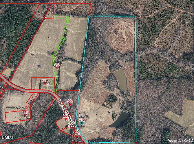 212 Thomas Humphries Road Roxboro, NC 27574 - Photo 3 of 56 an aerial view of a house with outdoor space