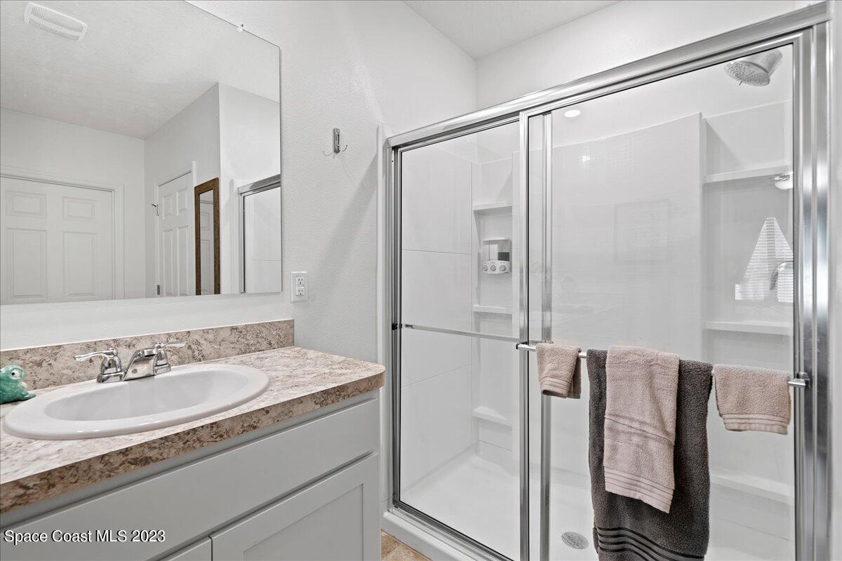 2103 Capital Drive Palm Bay, FL 32909 - Photo 23 of 84 Master walk in shower