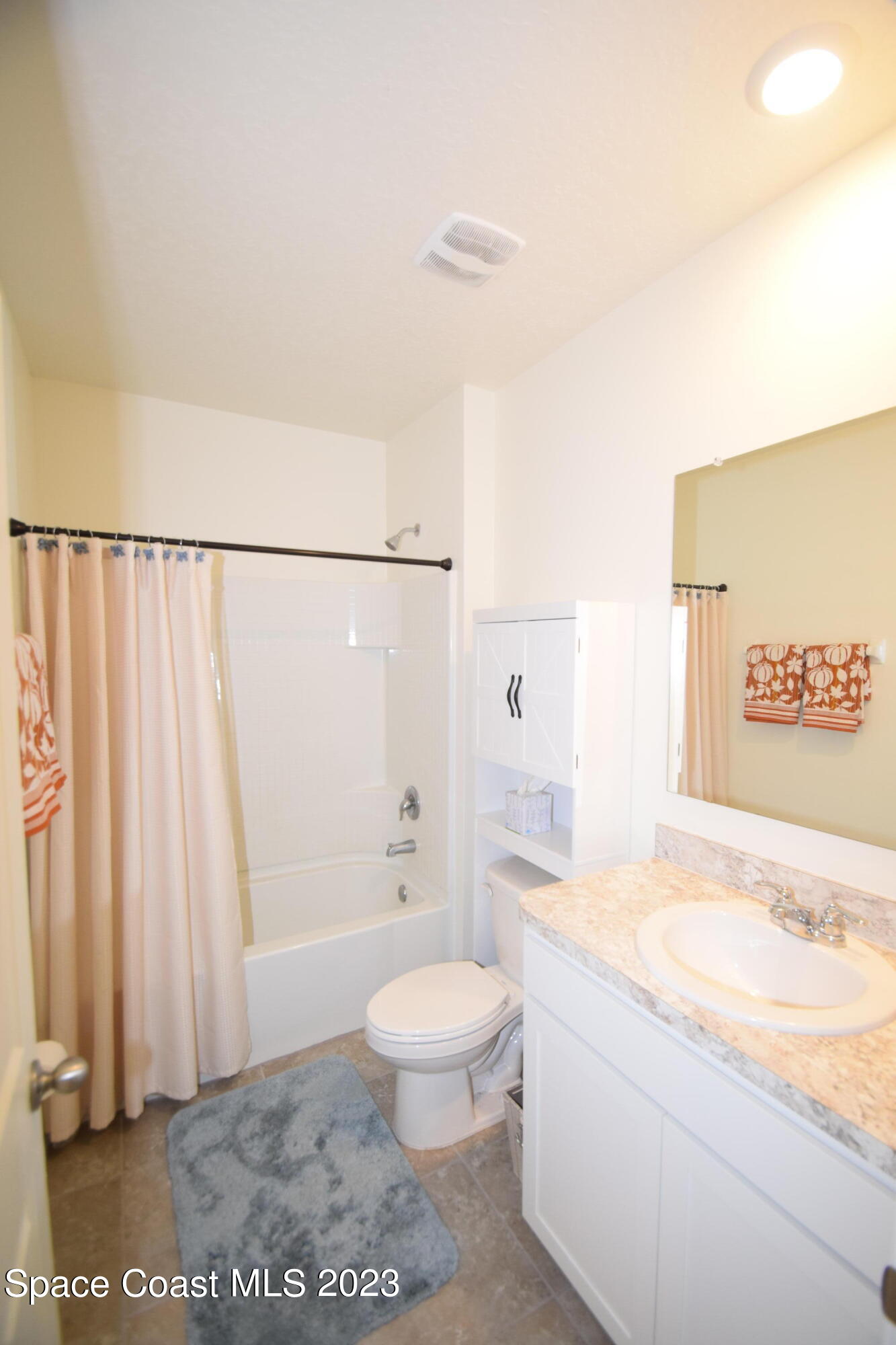 2103 Capital Drive Palm Bay, FL 32909 - Photo 59 of 84 a bathroom with a granite countertop sink a toilet and shower