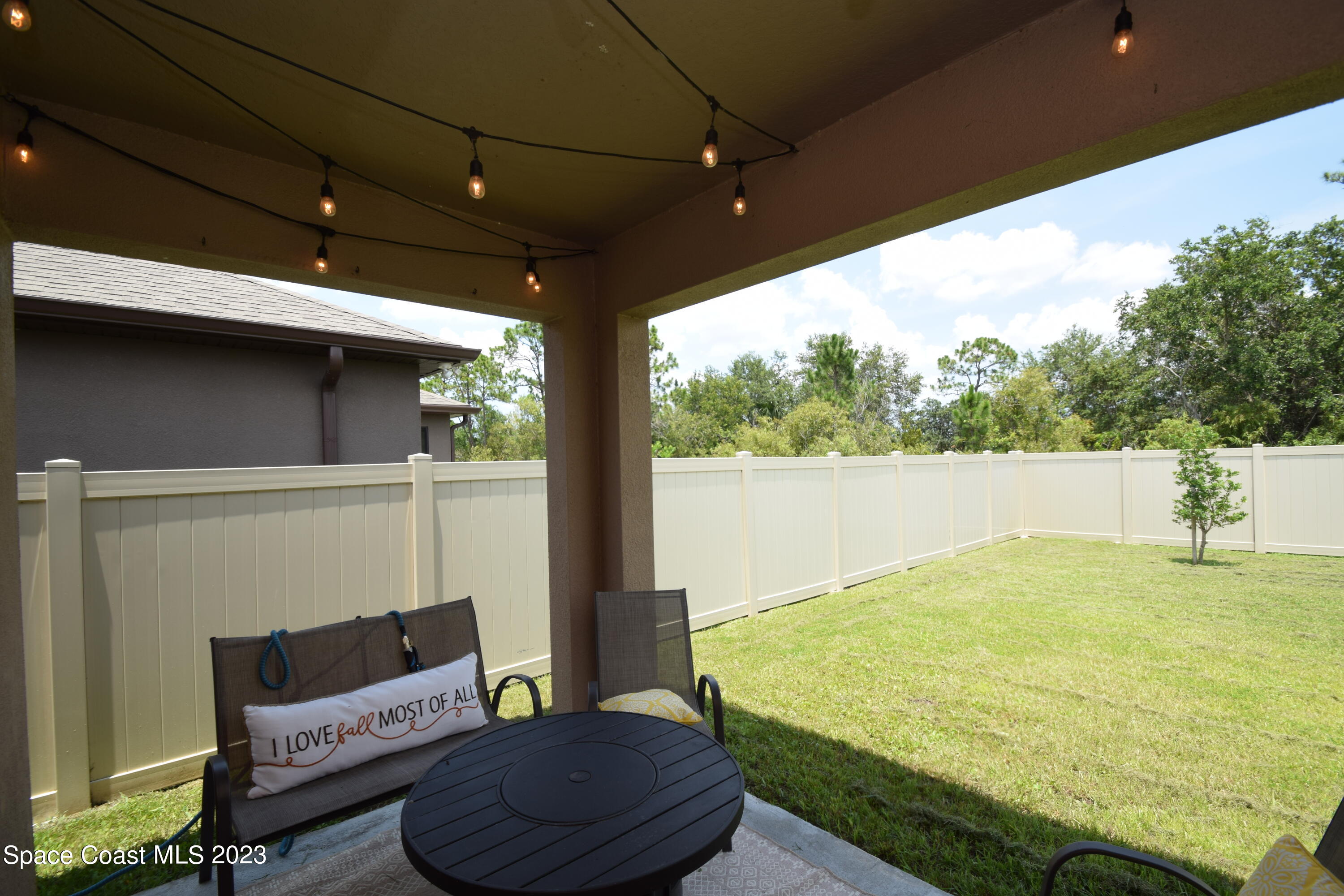 2103 Capital Drive Palm Bay, FL 32909 - Photo 66 of 84 a balcony with furniture and a potted plant