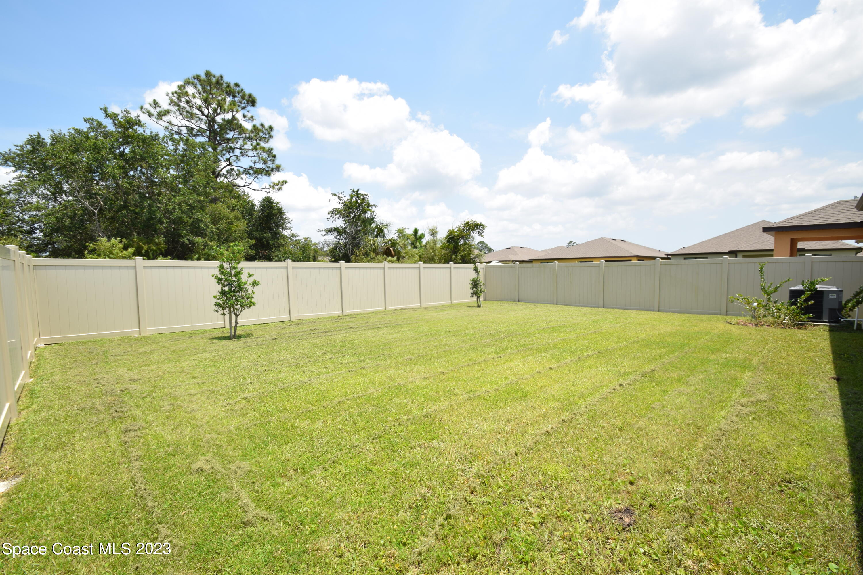 2103 Capital Drive Palm Bay, FL 32909 - Photo 68 of 84 a view of a swimming pool and an outdoor space
