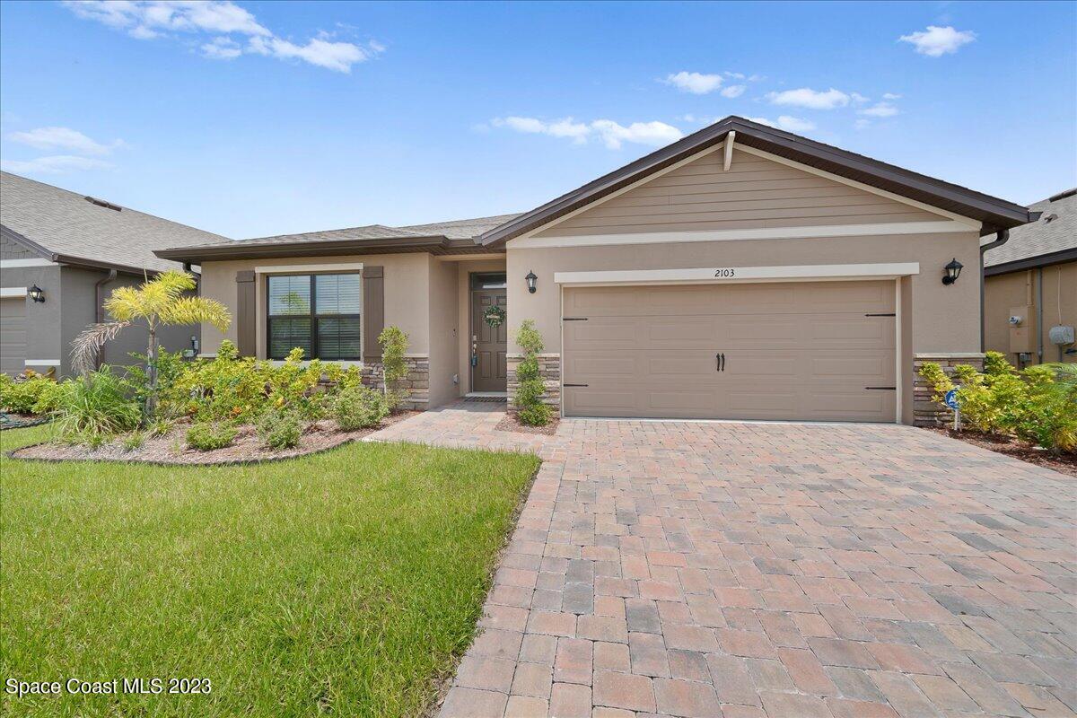 2103 Capital Drive Palm Bay, FL 32909 - Photo 79 of 84 a front view of house with yard