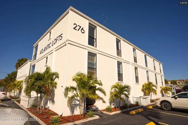a building with trees in front of it