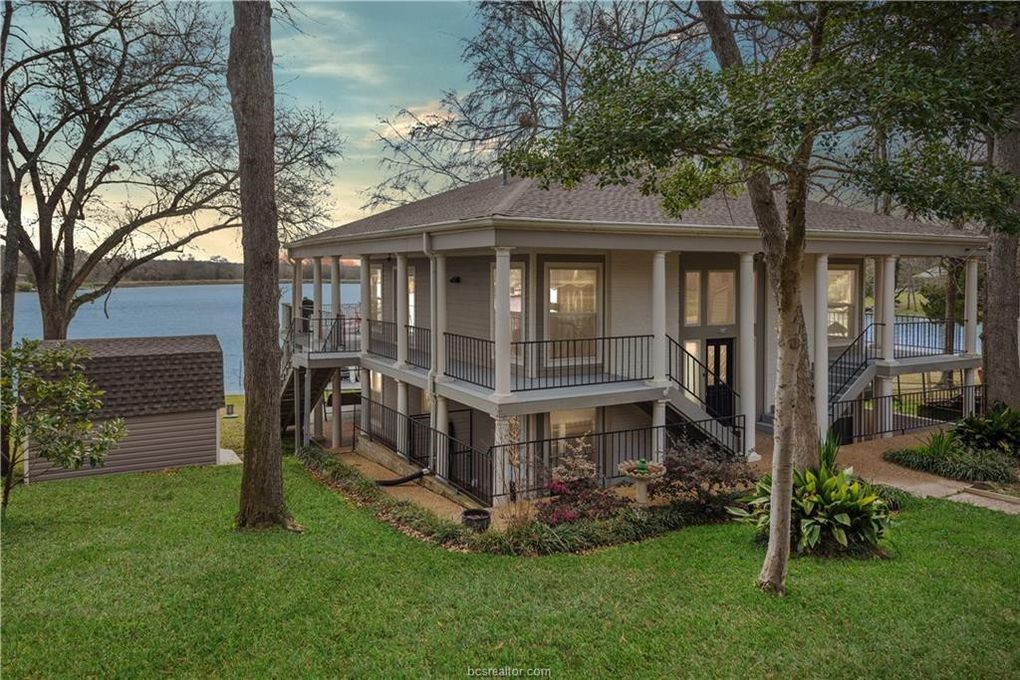 Lot 22 Hickory Ridge Drive Normangee, TX 77871 - Photo 20 of 27 a front view of a house with a garden and plants