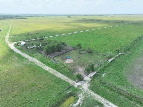 a view of a lake with a yard