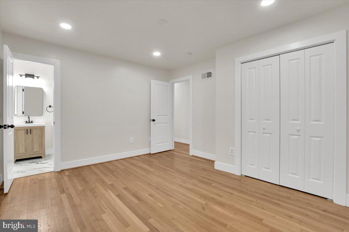 14624 Danville Road Woodbridge, VA 22193 - Photo 25 of 32 a view of a room with wooden floor and natural light