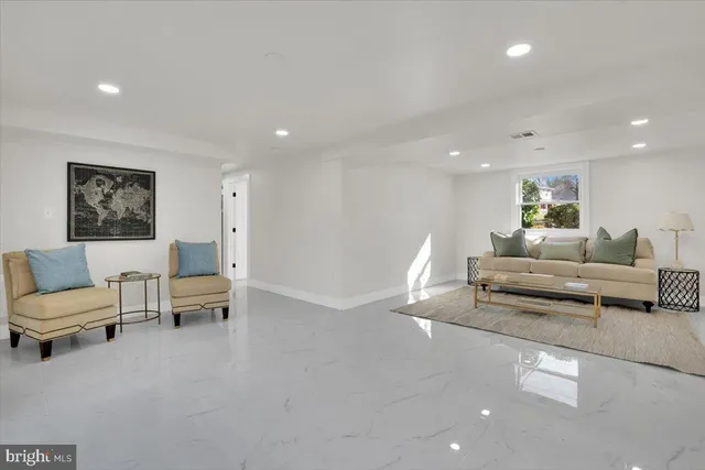 a living room with furniture and a couch