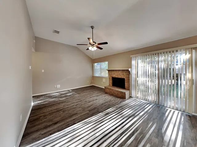a view of a livingroom with a fireplace