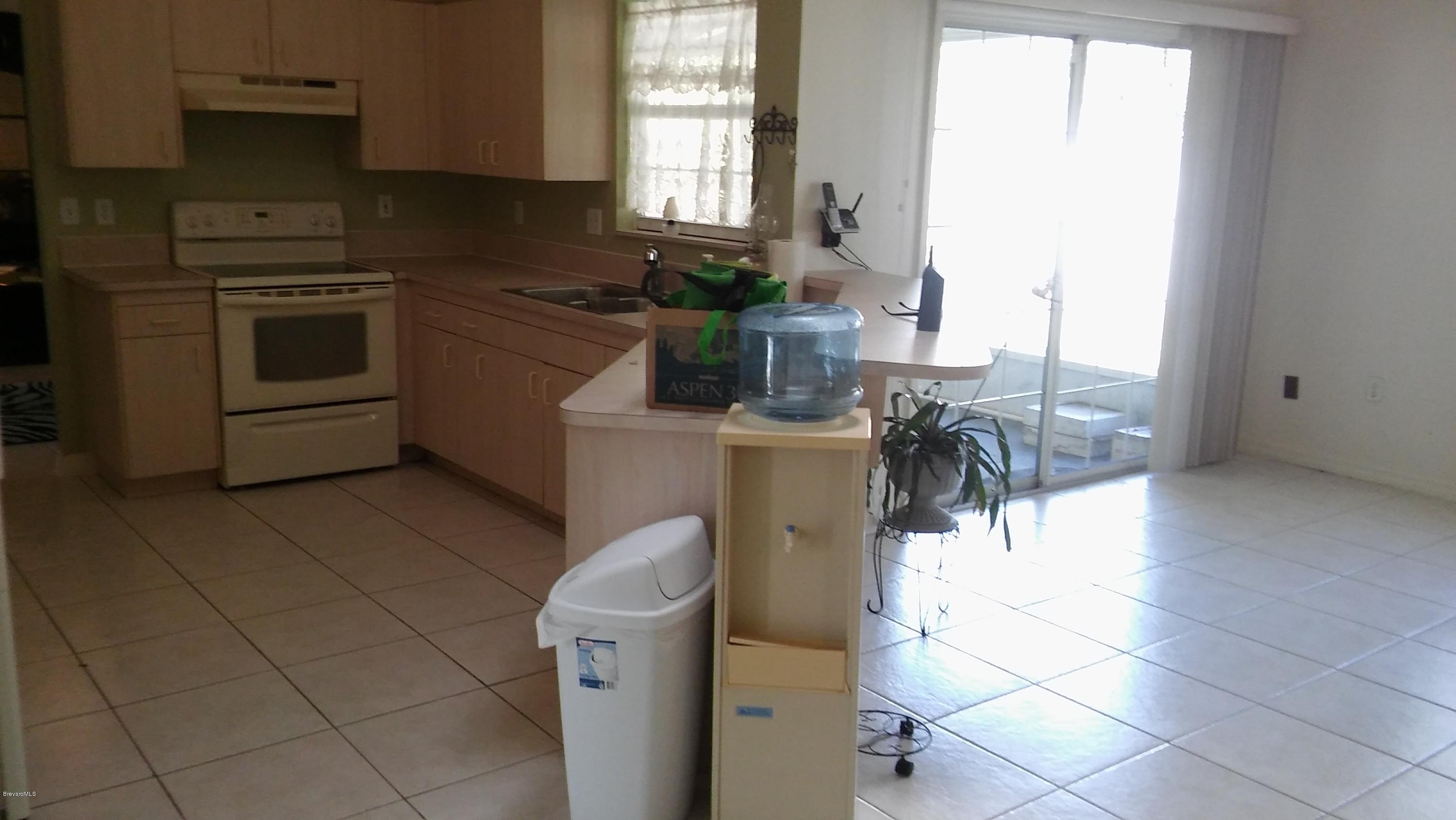 4120 Delespine Road Cocoa, FL 32927 - Photo 5 of 15 Kithen opening to Family