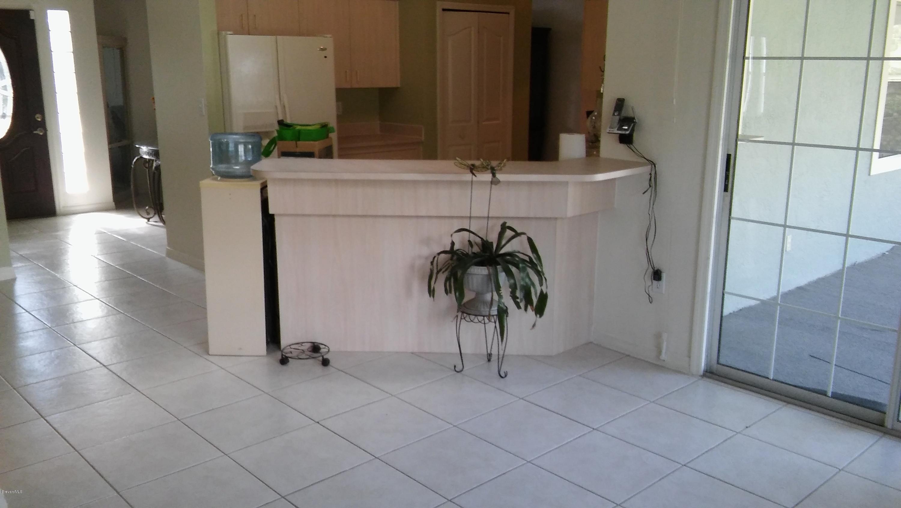 4120 Delespine Road Cocoa, FL 32927 - Photo 6 of 15 View of Kithen from Family Room