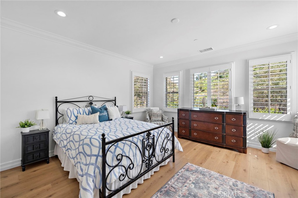 14 Via Inca San Clemente, CA 92673 - Photo 18 of 29 a bedroom with a bed and wooden floor