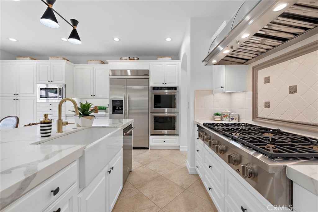 14 Via Inca San Clemente, CA 92673 - Photo 2 of 29 a kitchen with stainless steel appliances a sink stove and cabinets