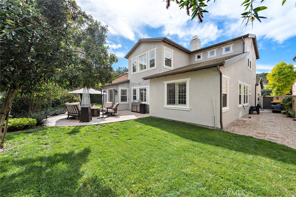 14 Via Inca San Clemente, CA 92673 - Photo 25 of 29 a view of a house with backyard sitting area and garden