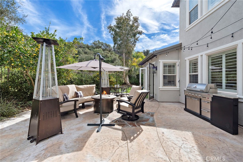 14 Via Inca San Clemente, CA 92673 - Photo 26 of 29 a view of a patio with a dining table and chairs