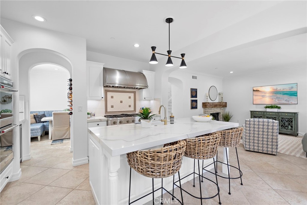 14 Via Inca San Clemente, CA 92673 - Photo 3 of 29 a kitchen with stainless steel appliances kitchen island granite countertop a sink and cabinets