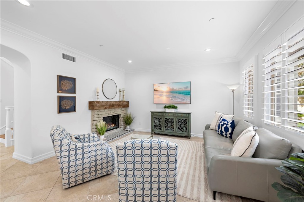 14 Via Inca San Clemente, CA 92673 - Photo 5 of 29 a living room with furniture fireplace and a flat screen tv