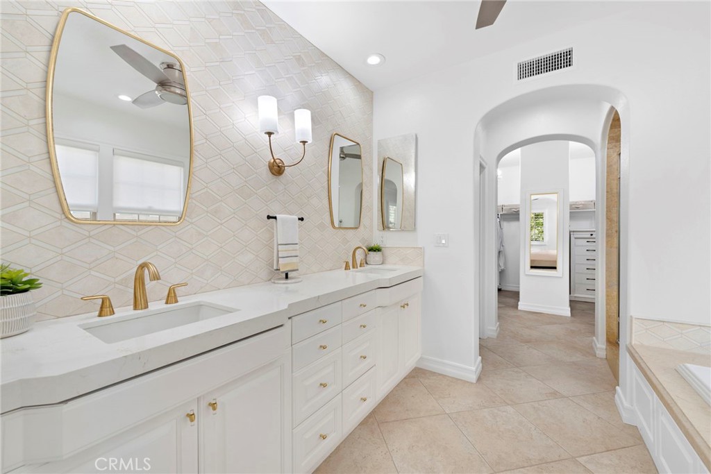 14 Via Inca San Clemente, CA 92673 - Photo 10 of 29 a spacious bathroom with a double vanity sink and mirror