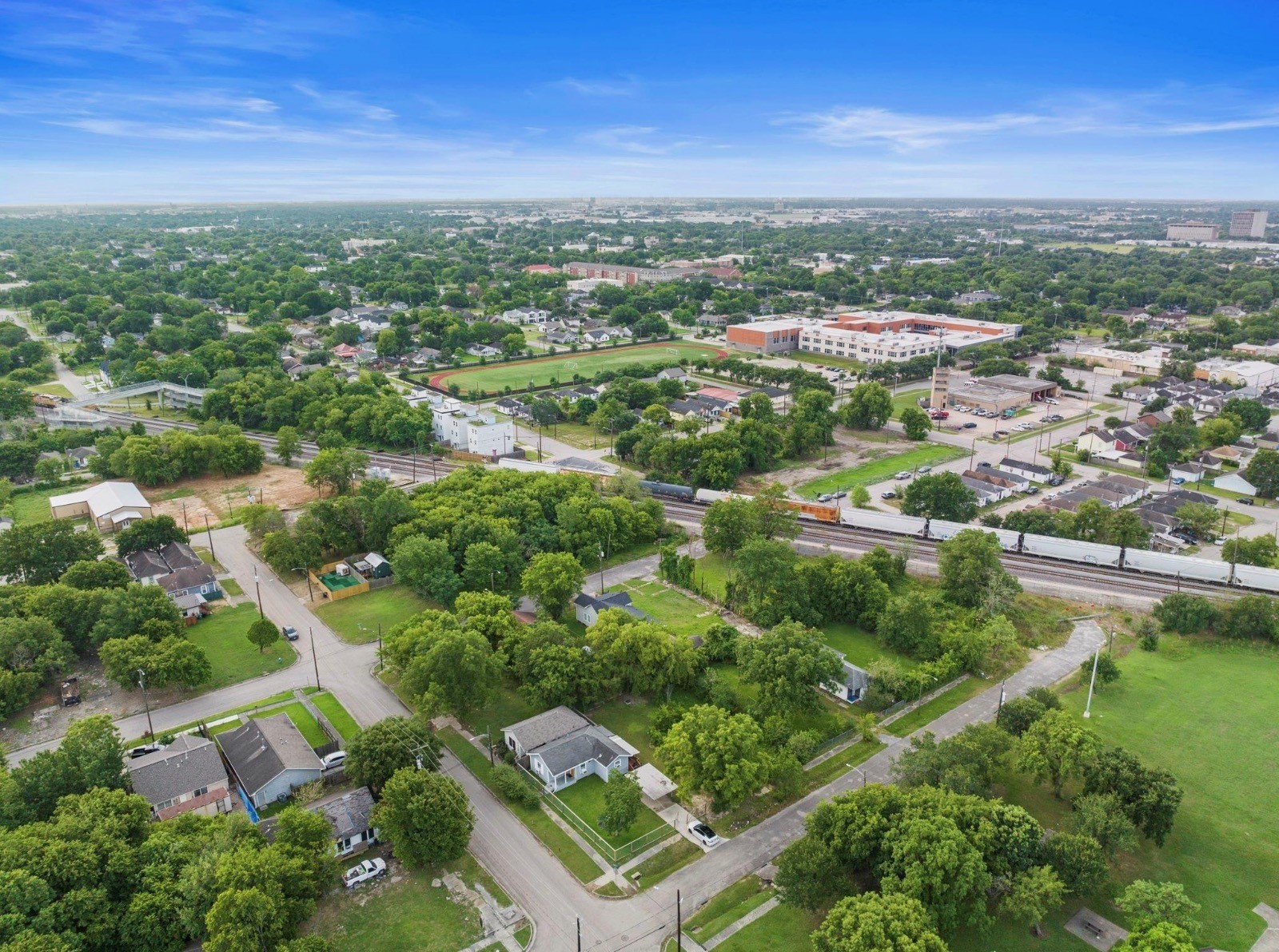 1919 Hailey Street Houston, TX 77026 - Photo 4 of 4 an aerial view of residential houses with outdoor space and river