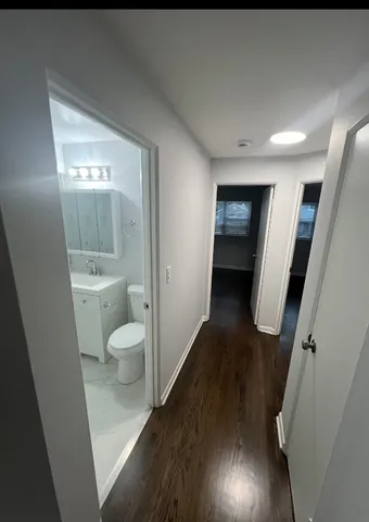a bathroom with a sink and mirror