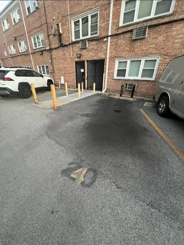 a view of street with parked cars