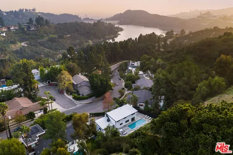 an aerial view of a town with couple of houses