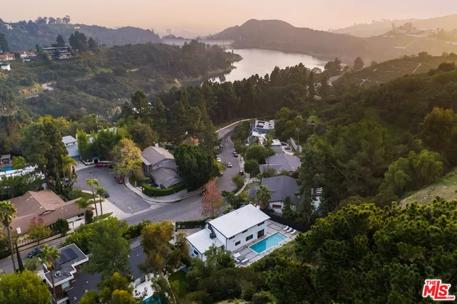 an aerial view of a town with couple of houses