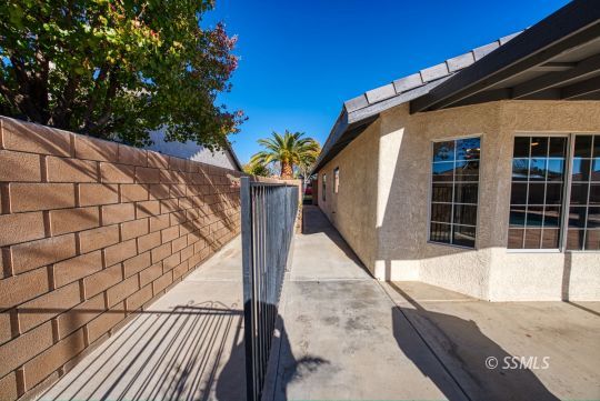 1221 Andrea Court Ridgecrest, CA 93555 - Photo 49 of 50 a view of a house with a tree