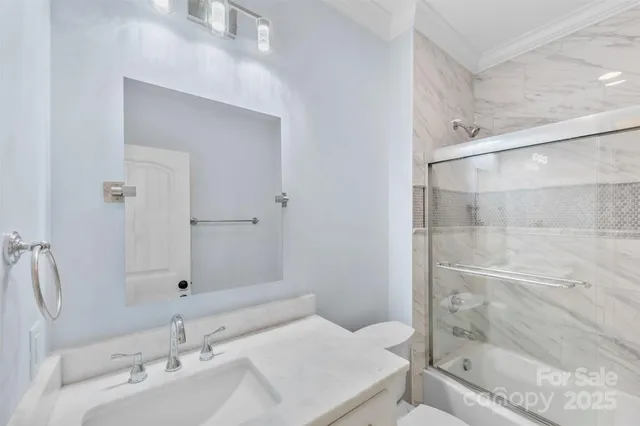 a bathroom with a bathtub and a sink