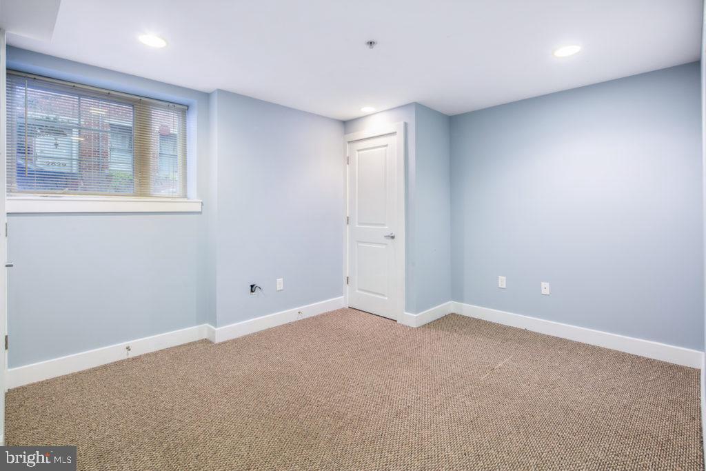 2614 Webster Street, Unit A Philadelphia, PA 19146 - Photo 7 of 12 a view of an empty room with a window