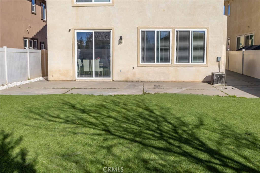 1639 Rigel Street Beaumont, CA 92223 - Photo 15 of 16 a view of house with backyard and garden