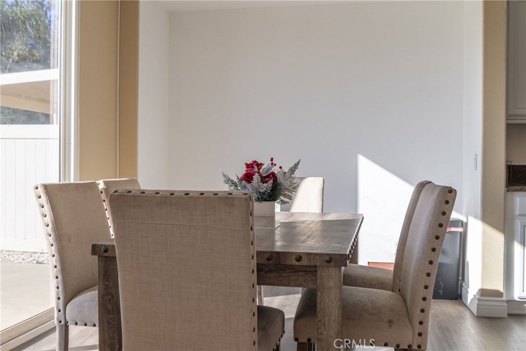 1639 Rigel Street Beaumont, CA 92223 - Photo 6 of 16 a view of kitchen with furniture and wooden floor