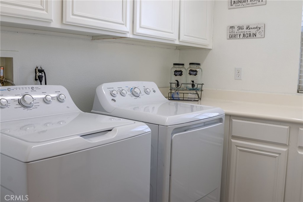 1639 Rigel Street Beaumont, CA 92223 - Photo 9 of 16 a utility room with dryer and washer