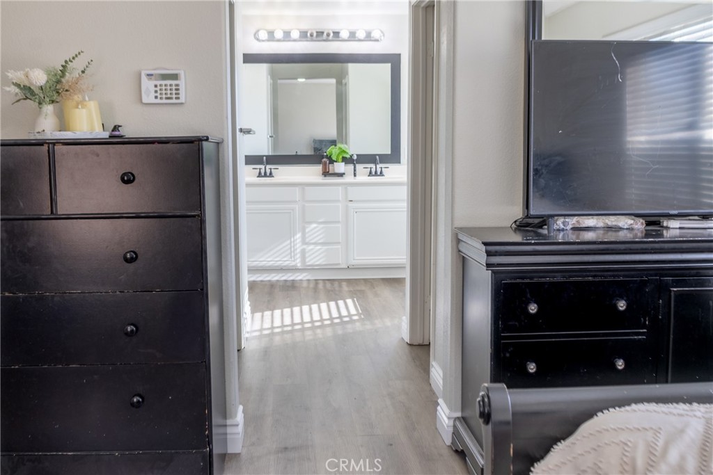 1639 Rigel Street Beaumont, CA 92223 - Photo 10 of 16 a living room with furniture and a flat screen tv