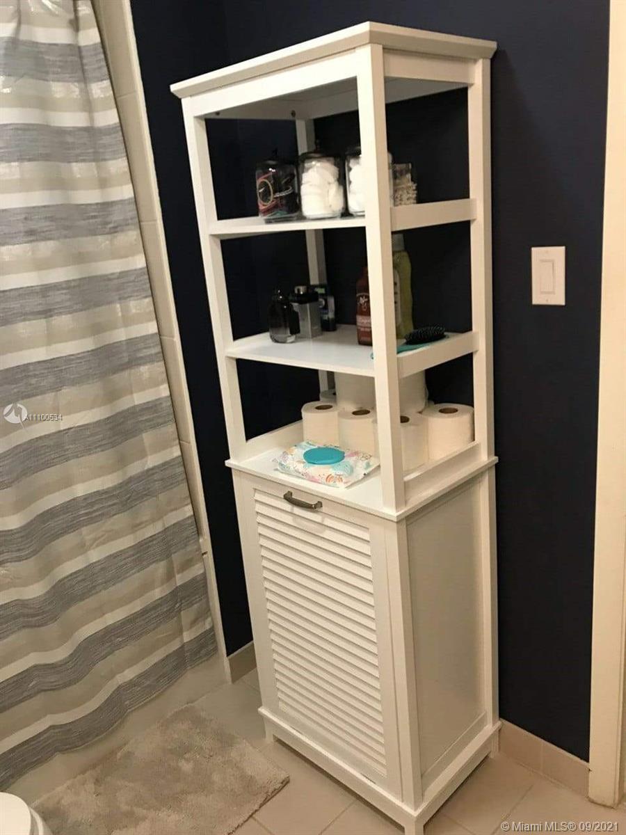 2889 McFarlane Road, Unit 1603 Miami, FL 33133 - Photo 12 of 16 a utility room with dryer and washer