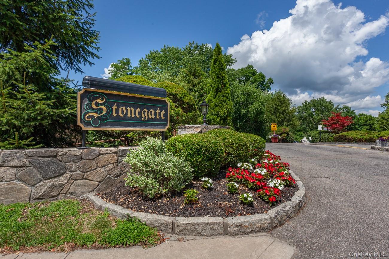 a view of a street with a building in the background