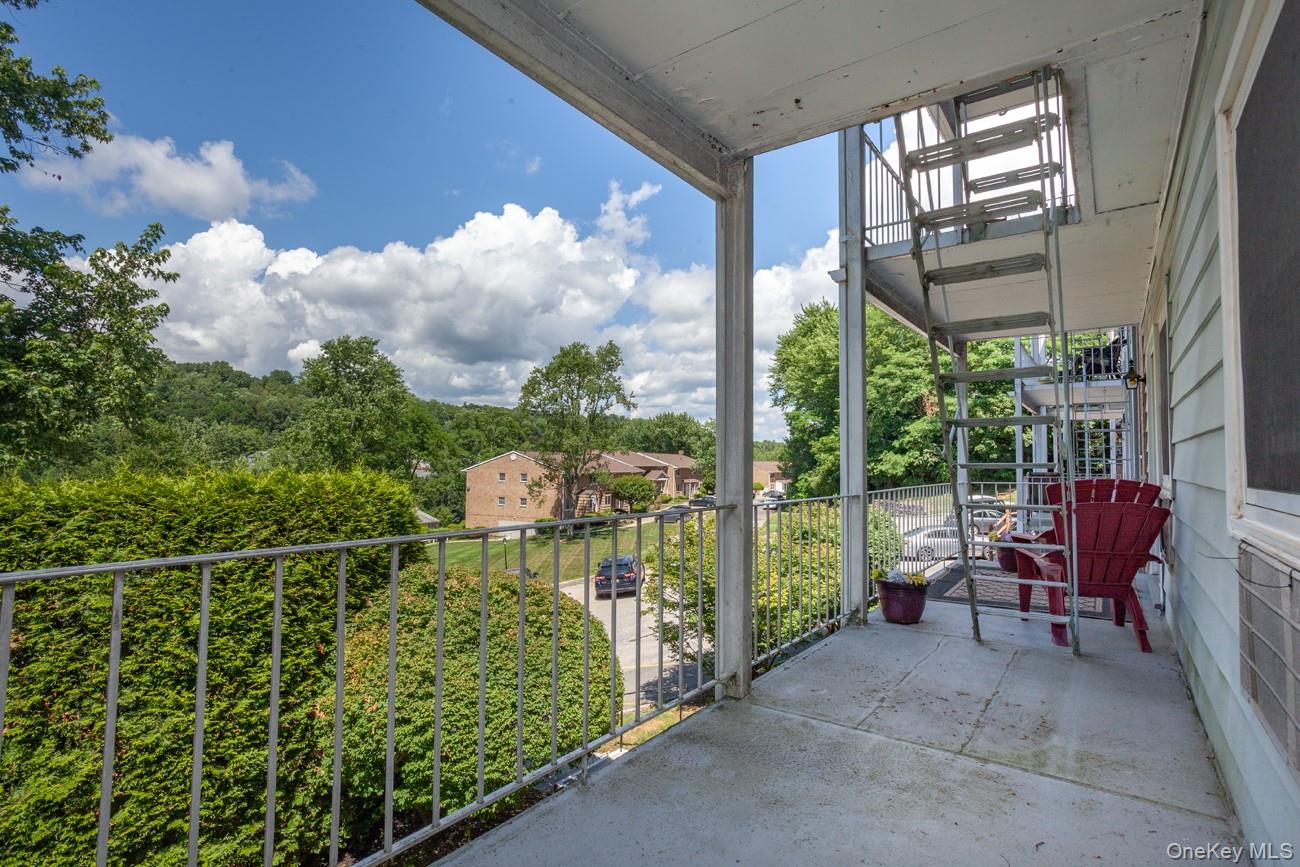 1840 Crompond Road, Unit 7B8 Peekskill, NY 10566 - Photo 16 of 22 a view of a chairs and table in the balcony