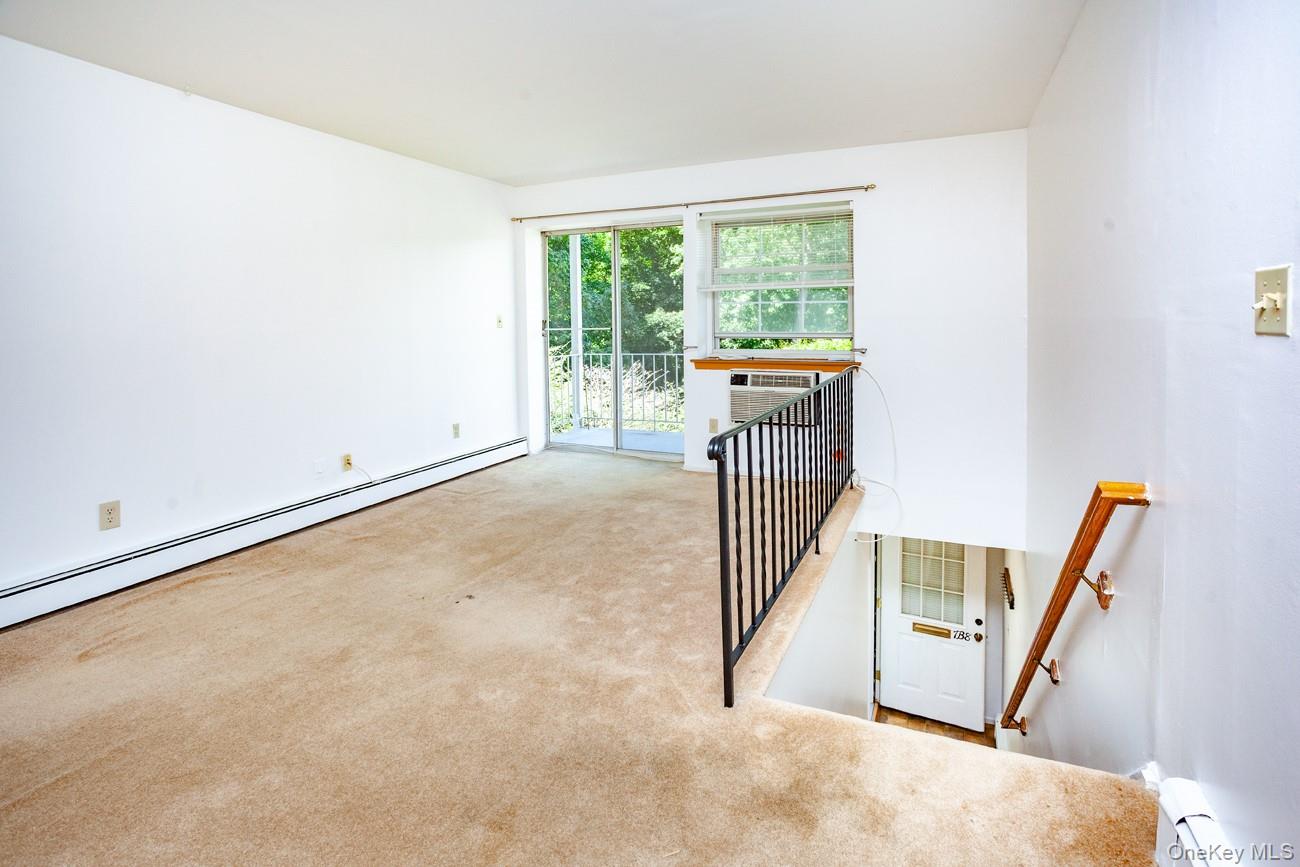 1840 Crompond Road, Unit 7B8 Peekskill, NY 10566 - Photo 6 of 22 a view of a room with stairs