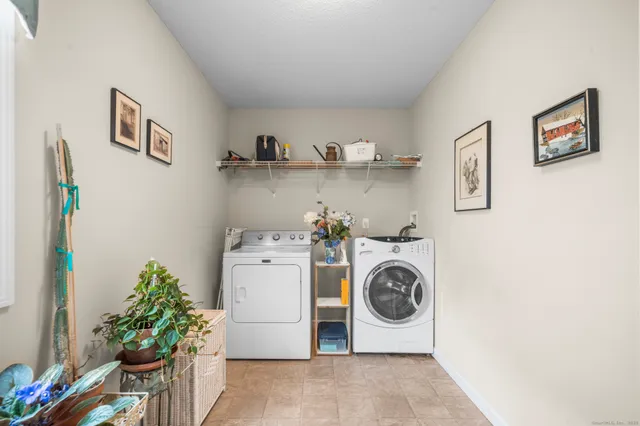 a view of a yard in front of a house with plants