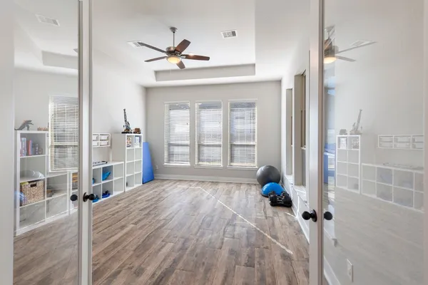 a bedroom with a bed and a cabinets