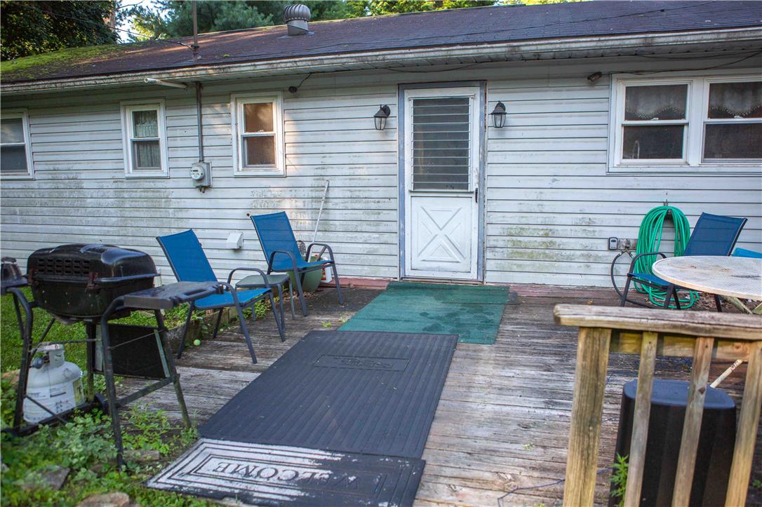 8657 South Loop Road Slatington, PA 18080 - Photo 23 of 32 A spacious wooden deck provides ample outdoor living space just off the main structure.
