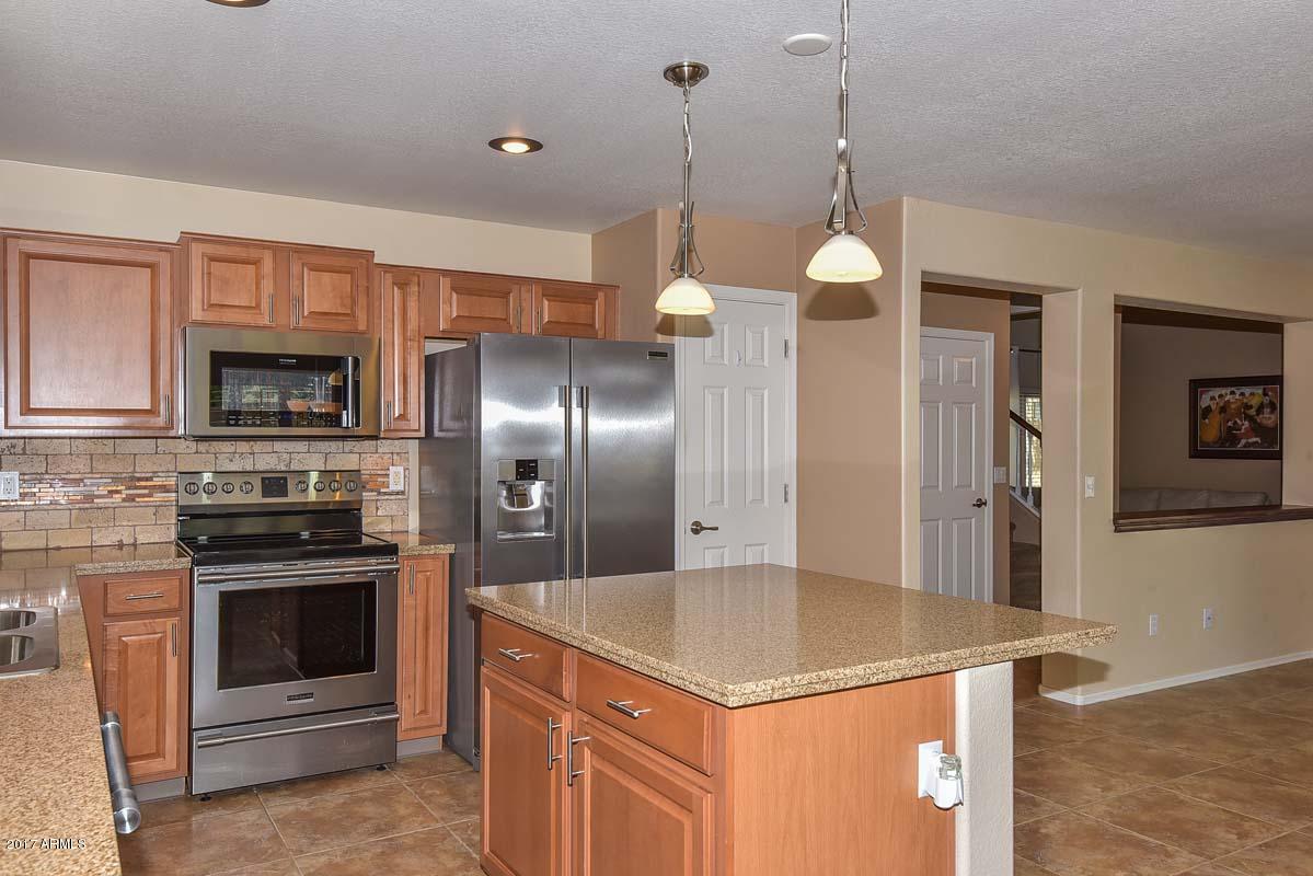 17424 West Boca Raton Road Surprise, AZ 85388 - Photo 15 of 38 Kitchen-Range