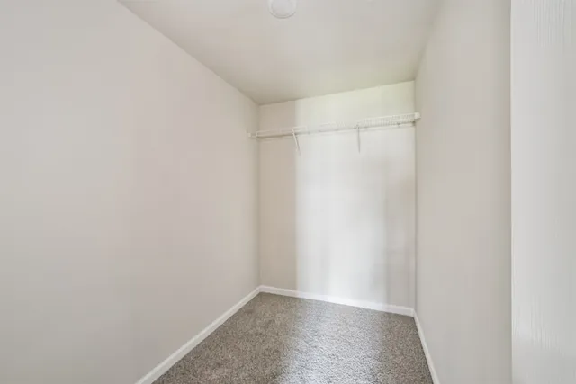 a view of an empty walk in closet