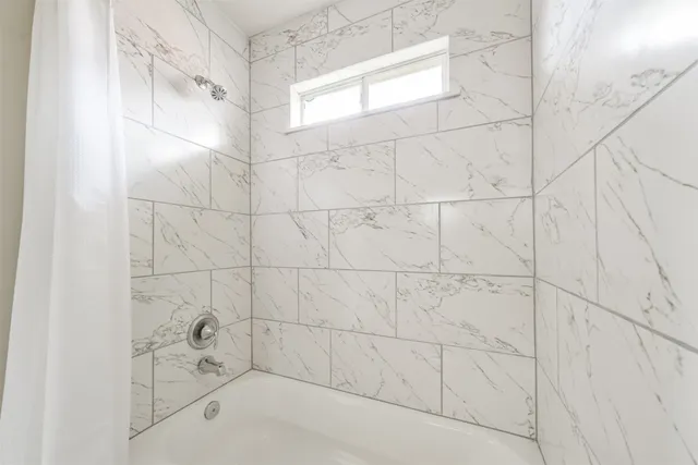 a bathroom with a bathtub