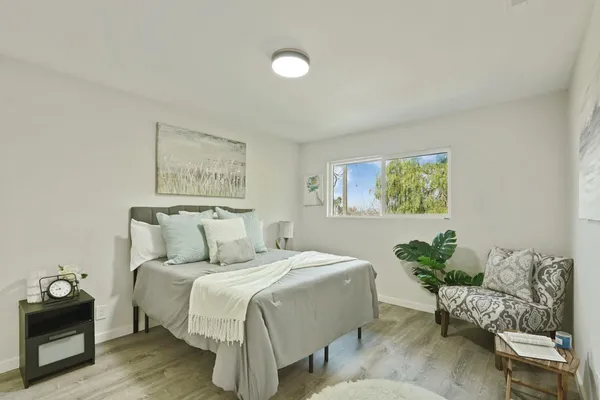 a bathroom with a sink a toilet and a bathtub