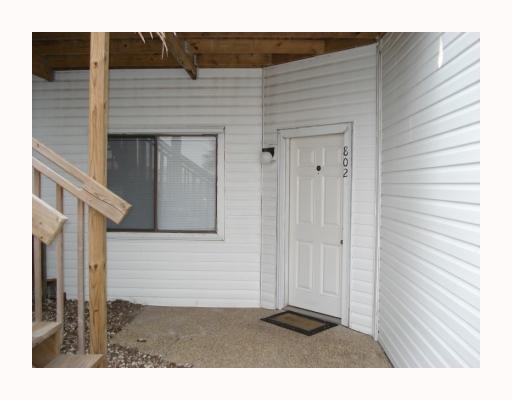 a black and white photo of a house