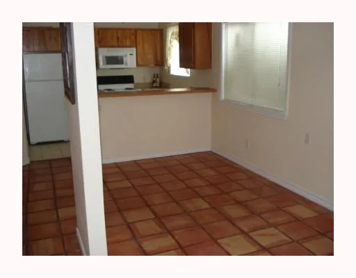 a view of kitchen with a sink