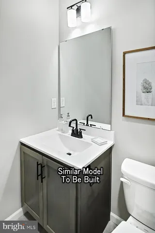 a bathroom with a sink and a toilet