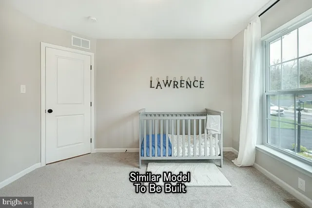 a view of a hallway with a window
